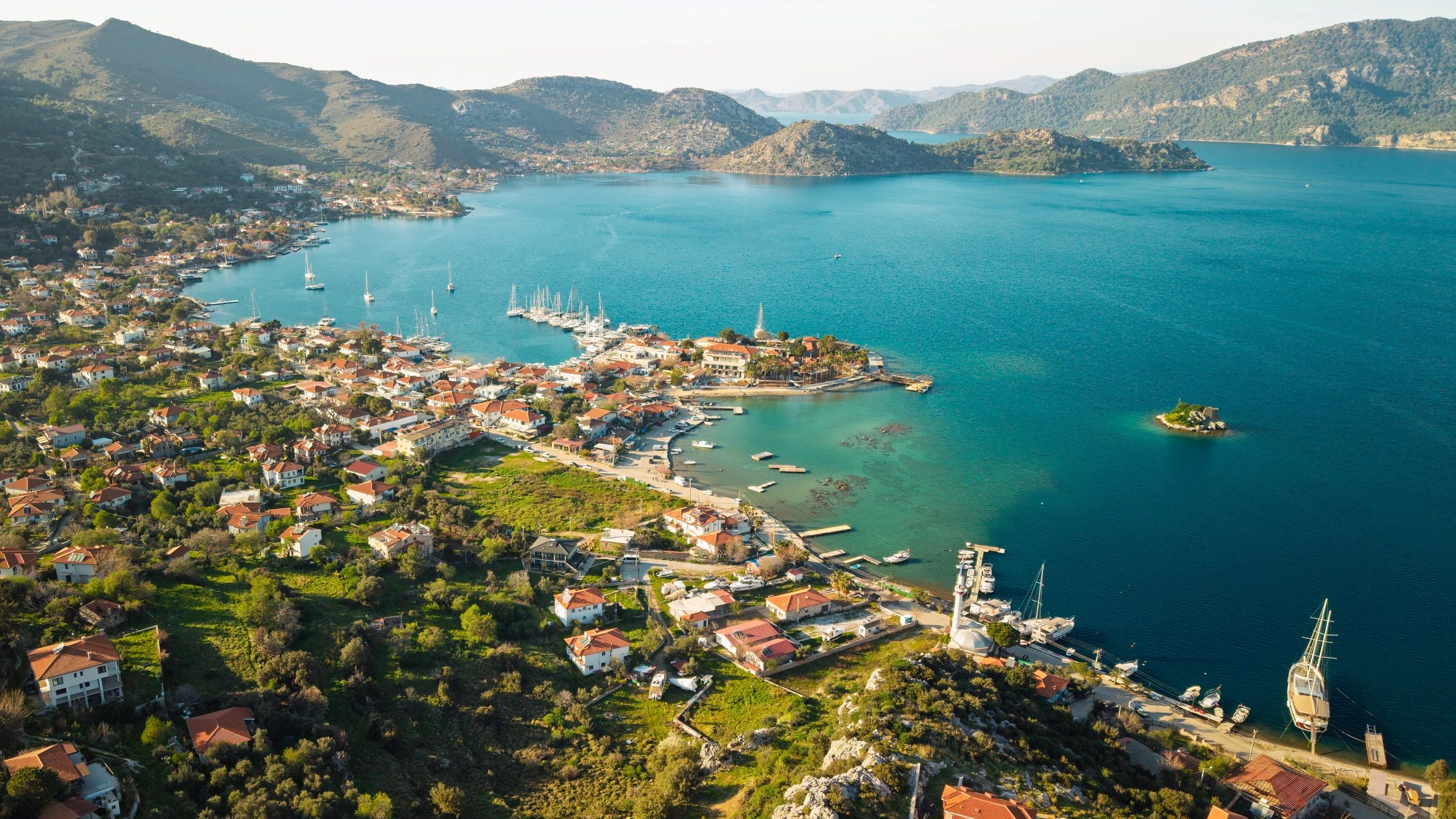 Aerial view of a turquoise marina on the Turkish coast